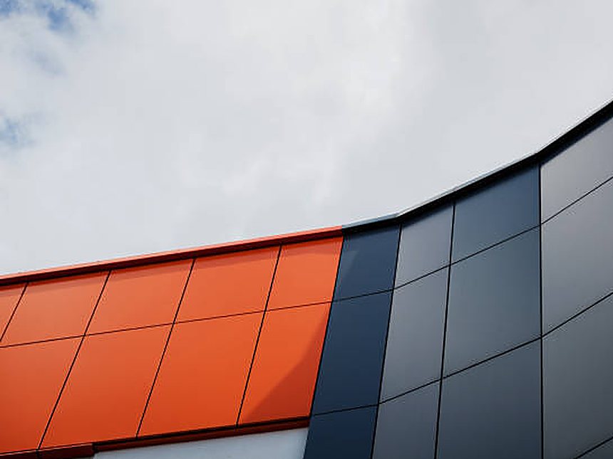 Rainscreen cassette panels forming a ventilated facade